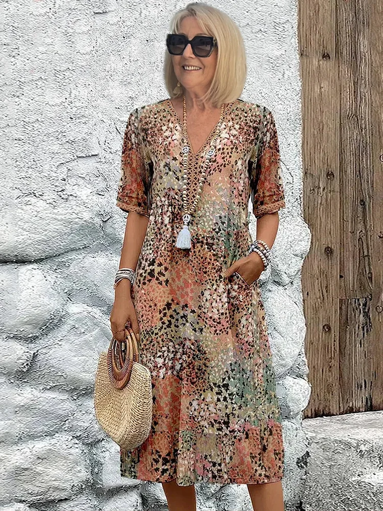 Anthea | Elegant blommig midiklänning
