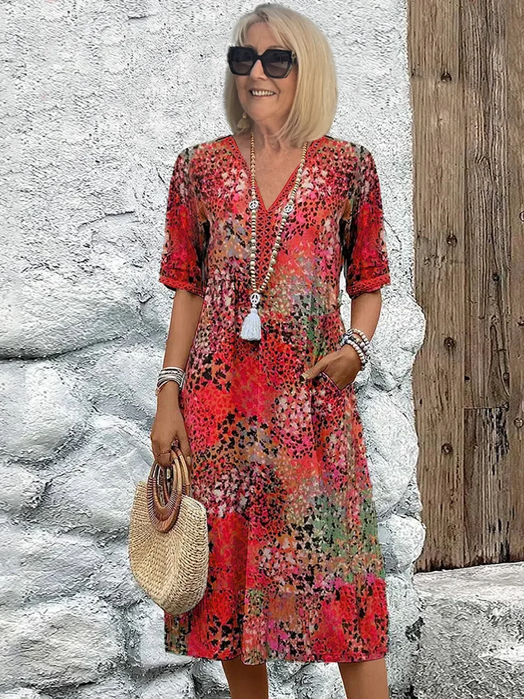 Anthea | Elegant blommig midiklänning