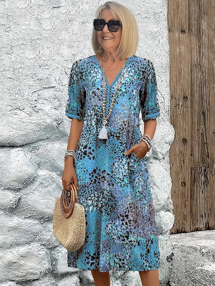 Anthea | Elegant blommig midiklänning